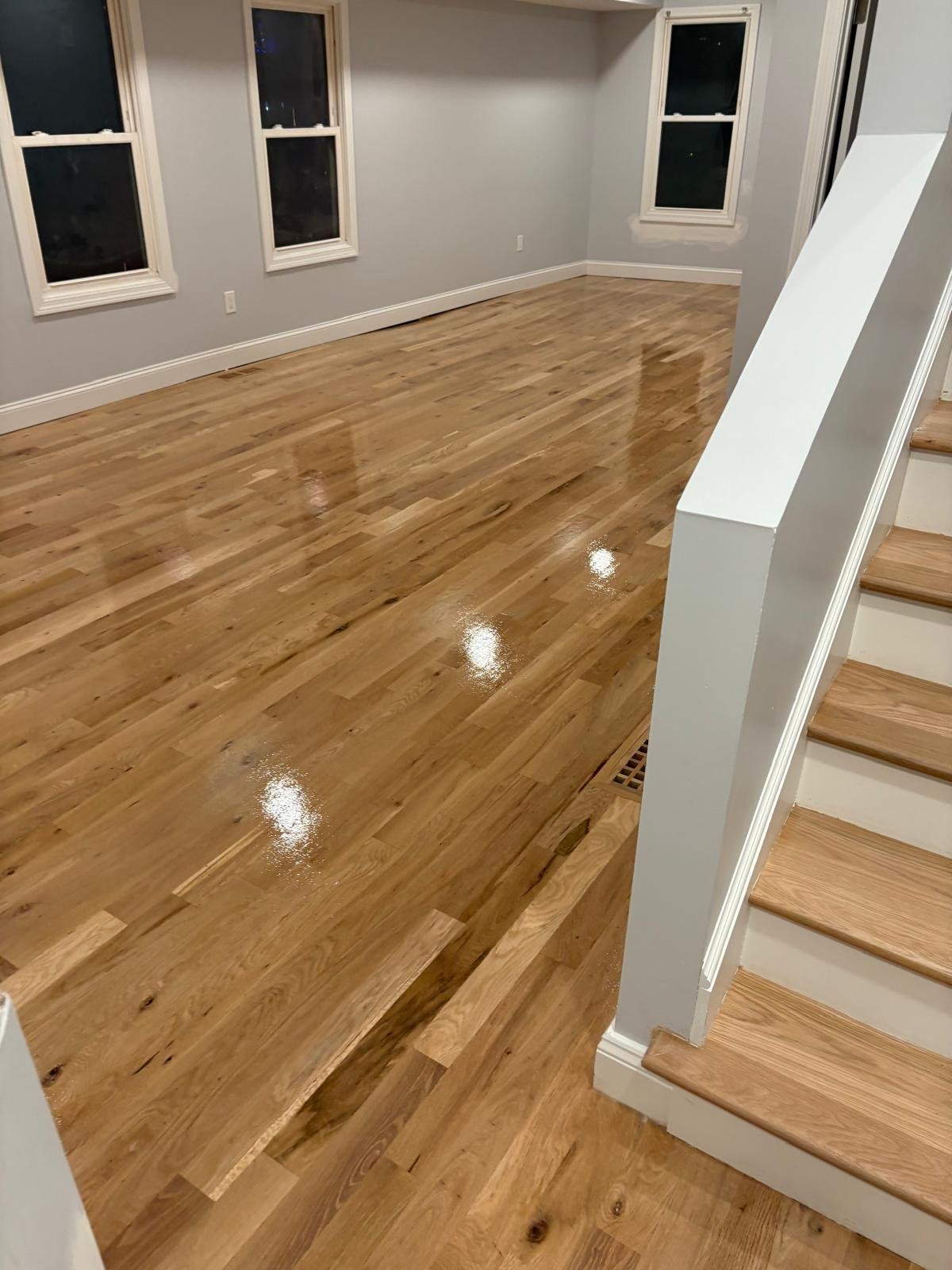 Refined flooring installation with hardwood surfaces and clean transitions
